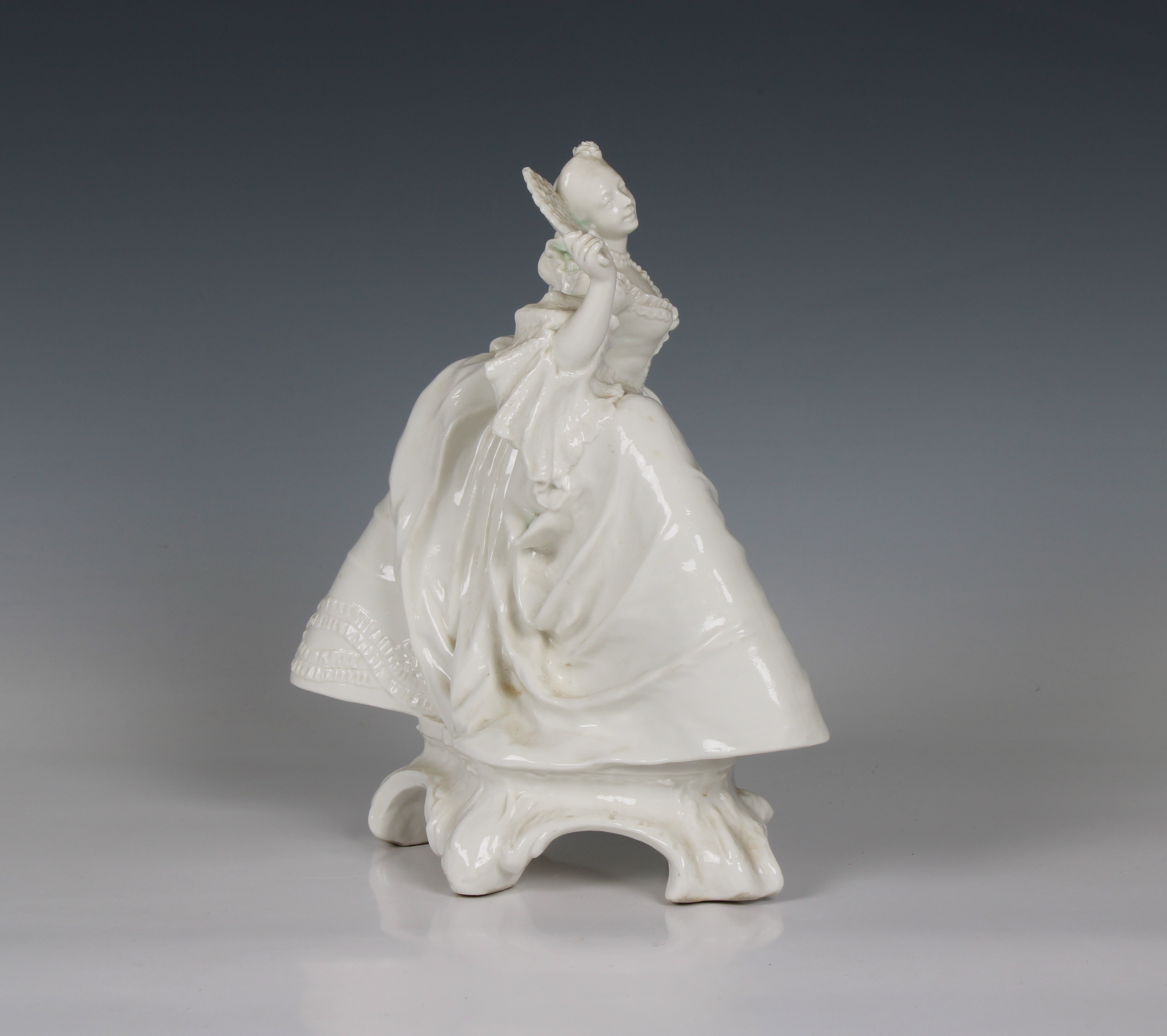 A Nymphenburg white porcelain figure of a lady with a fan - Image 2 of 4