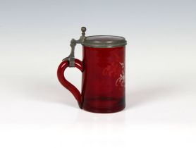 An early 20th Century ruby glass tankard