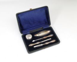 A George V cased silver manicure set