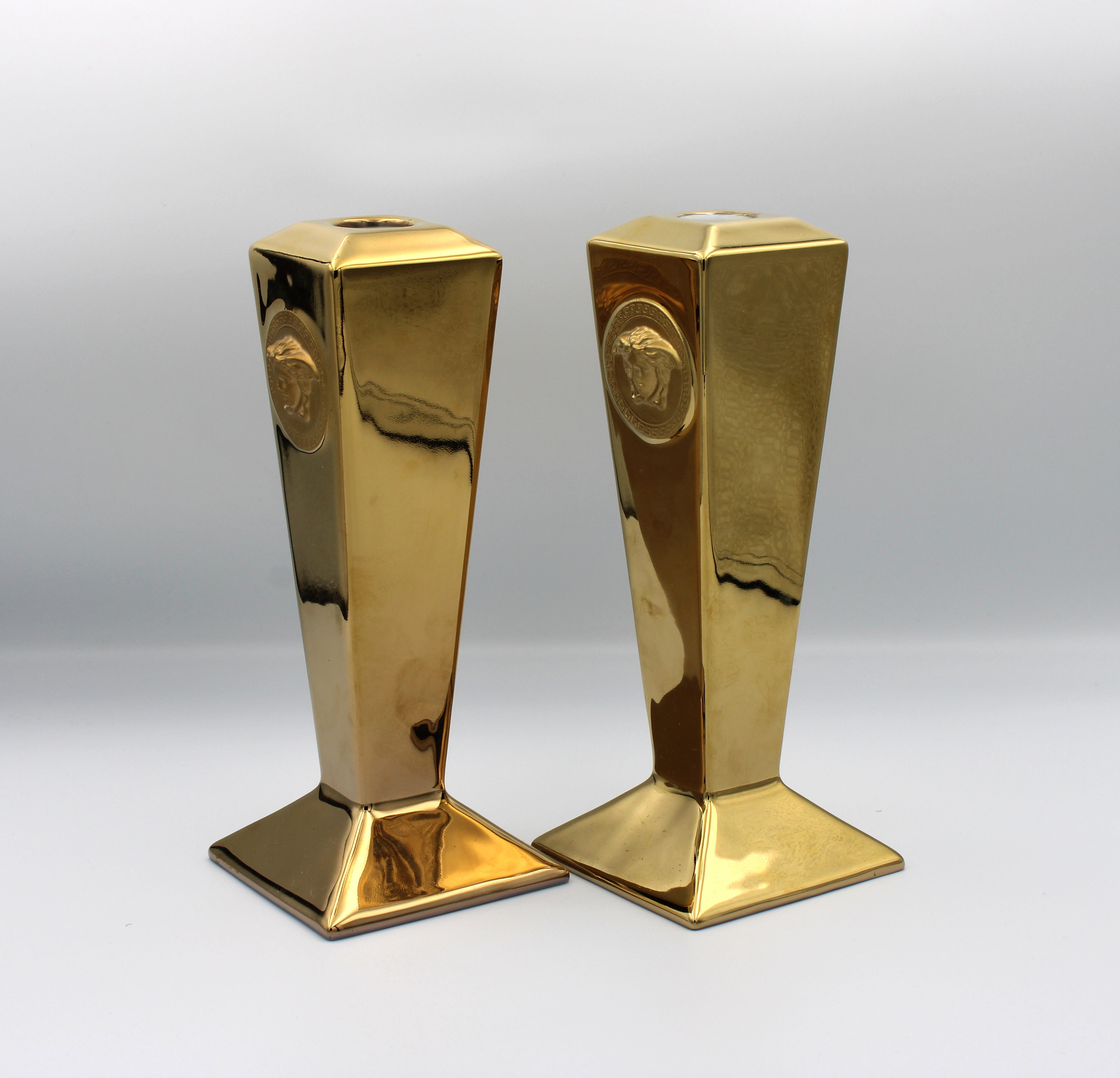 A pair of Rosenthal Versace metallic gold glazed candlesticks, Medusa masks to sides - Image 2 of 4