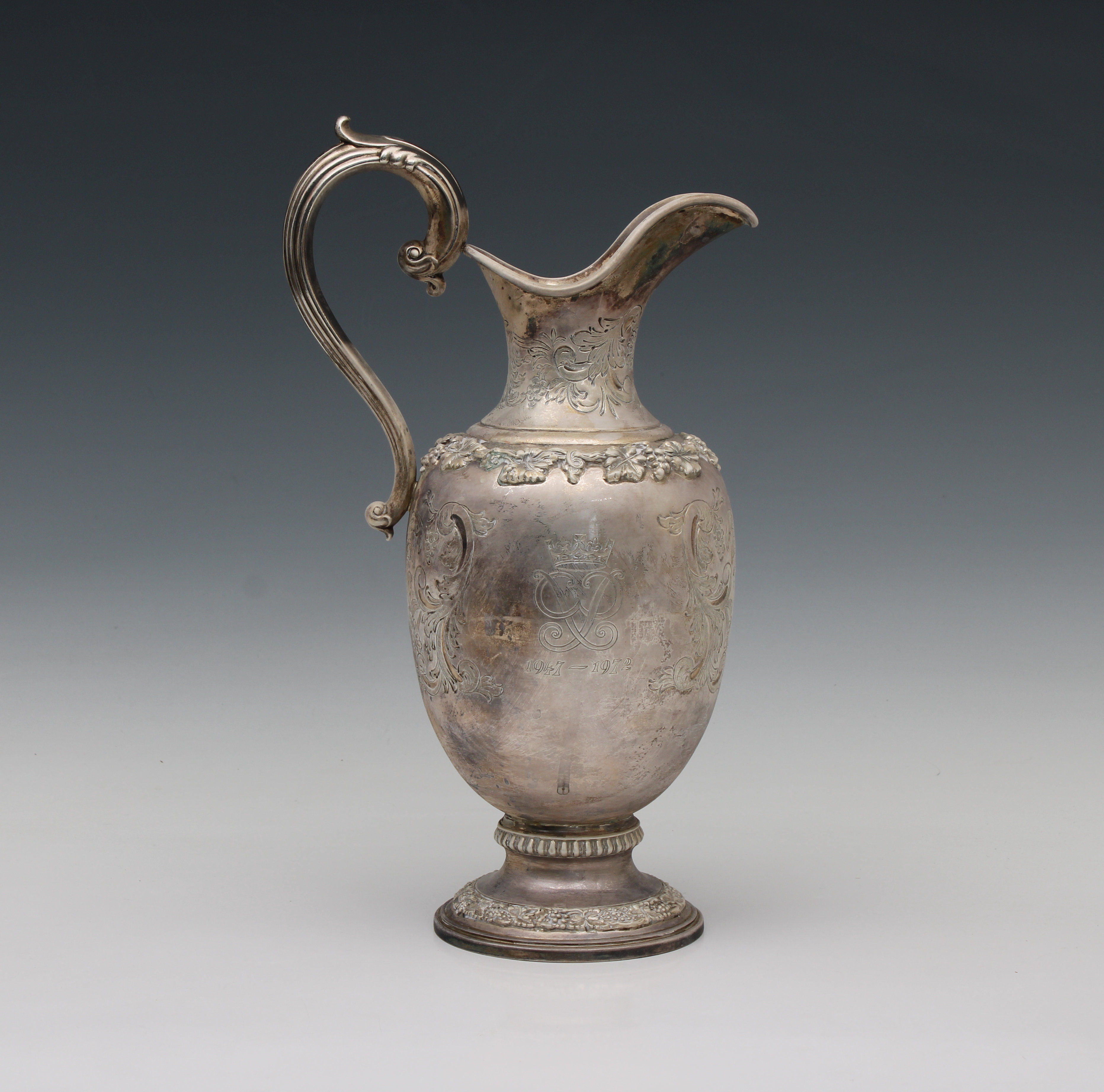 A Garrard silver limited edition wine jug / ewer commemorating the silver wedding of HM Queen Elizab - Image 3 of 6