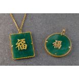 Two Chinese pendants with 14ct gold settings