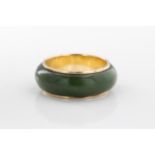 A jade and 14ct yellow gold ring