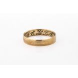 A 9ct yellow gold wedding ring