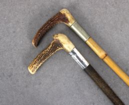 Two riding crops with antler horn handles