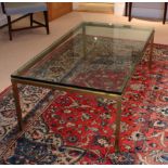 A large gilt brass and glass rectangular coffee table