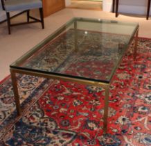 A large gilt brass and glass rectangular coffee table