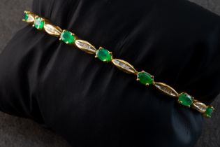 An emerald and diamond bracelet