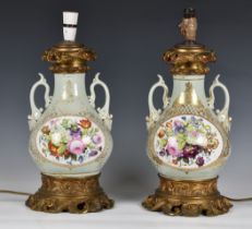 A pair of 19th century porcelain vase lamps