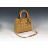 Christian Dior - A sand / caramel medium Lady Dior handbag
