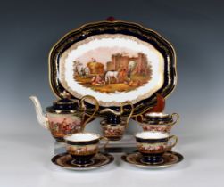 A blue, gold and painted two person tea set