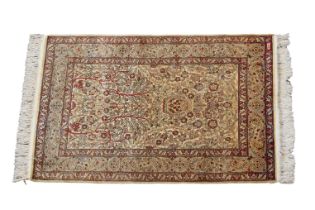 A signed Turkish silk Hereke rug