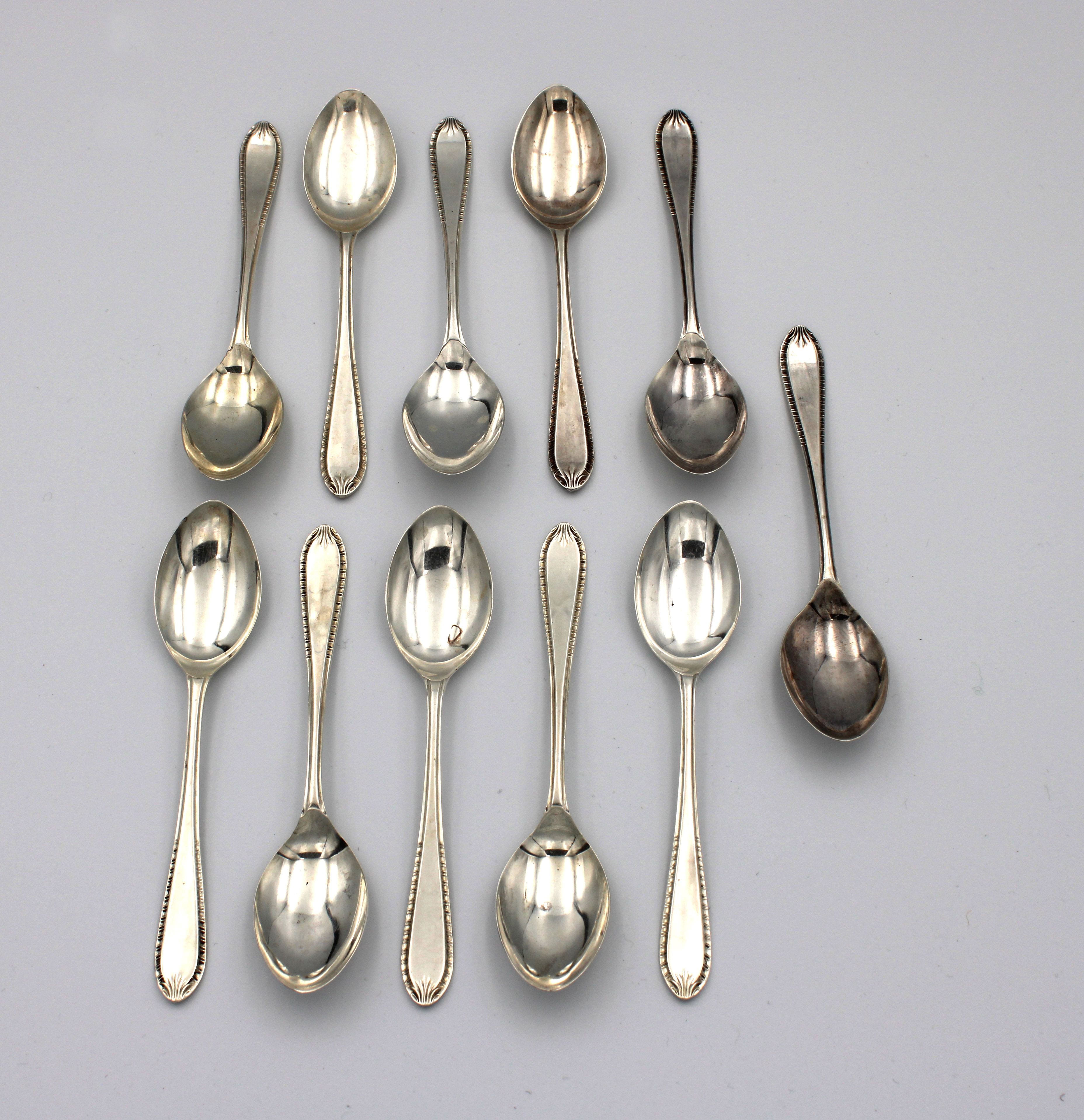 Eleven silver coffee spoons