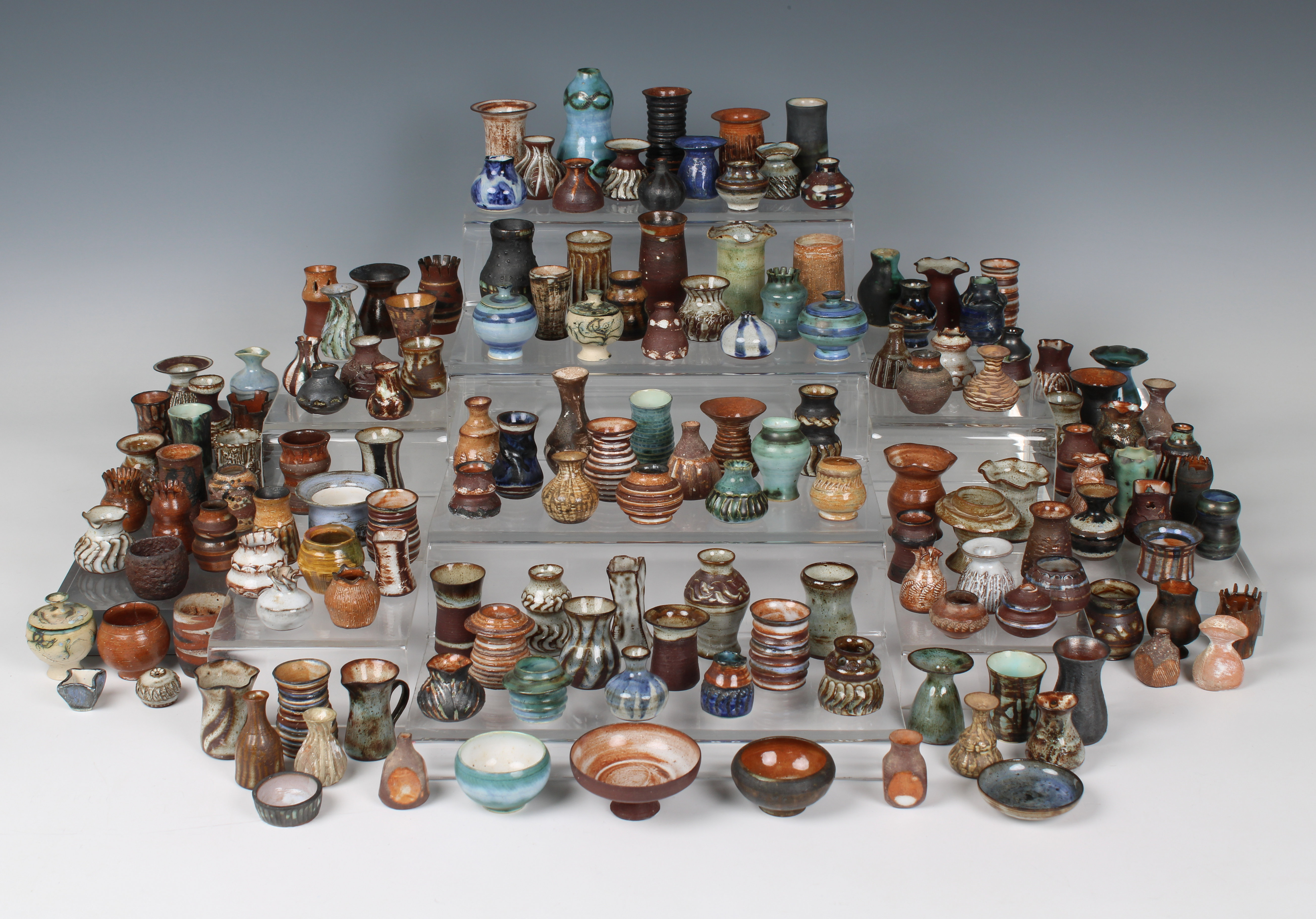 Elizabeth Ann Macphail (1939-89) A large collection of miniature pots, vases and dishes etc (150+)