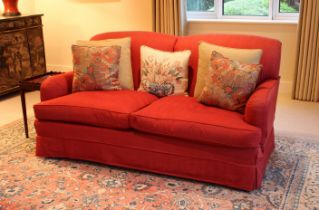 Pair of two seater sofas in red upholstery