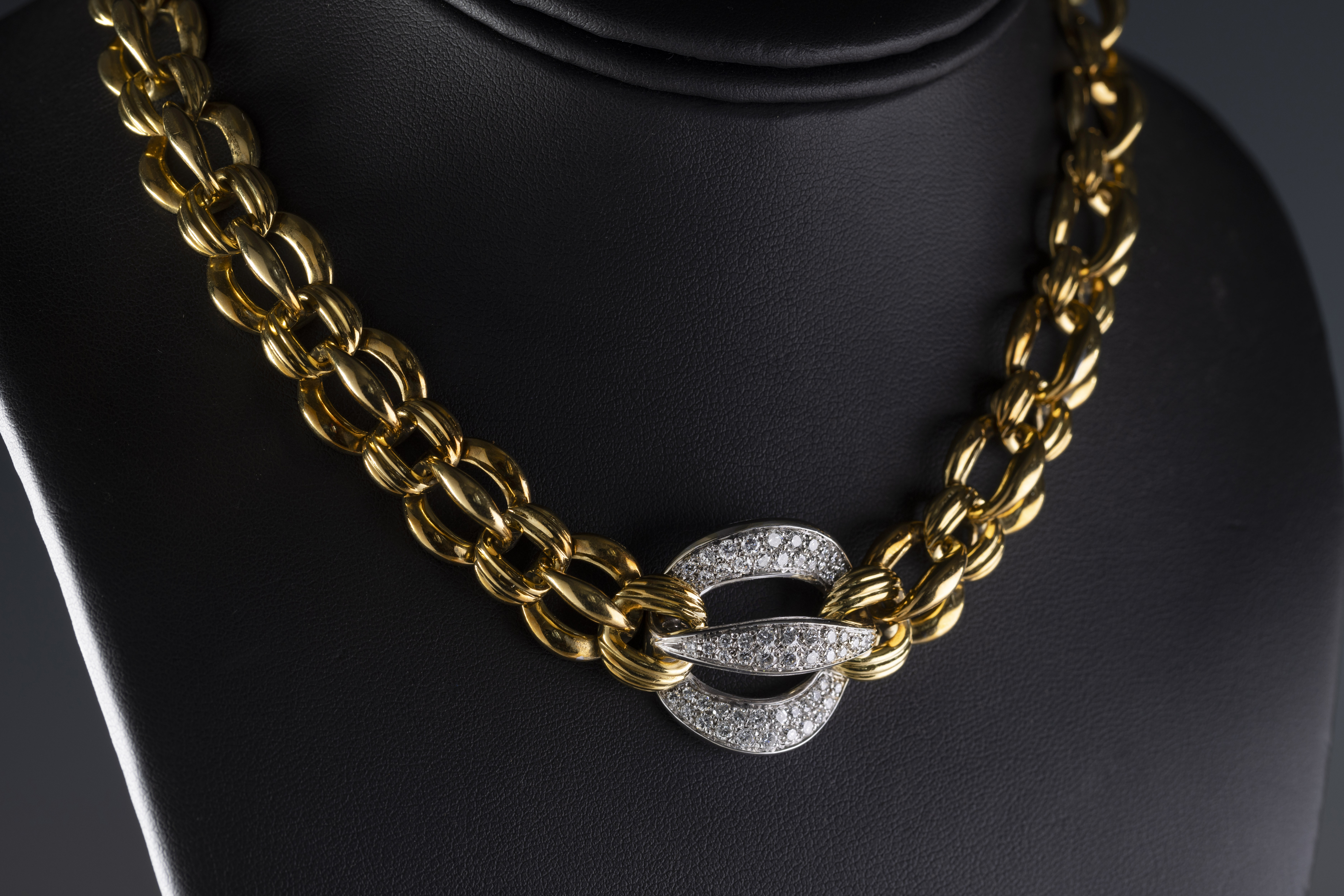 Damiani: an 18k yellow and white gold and diamond necklace,