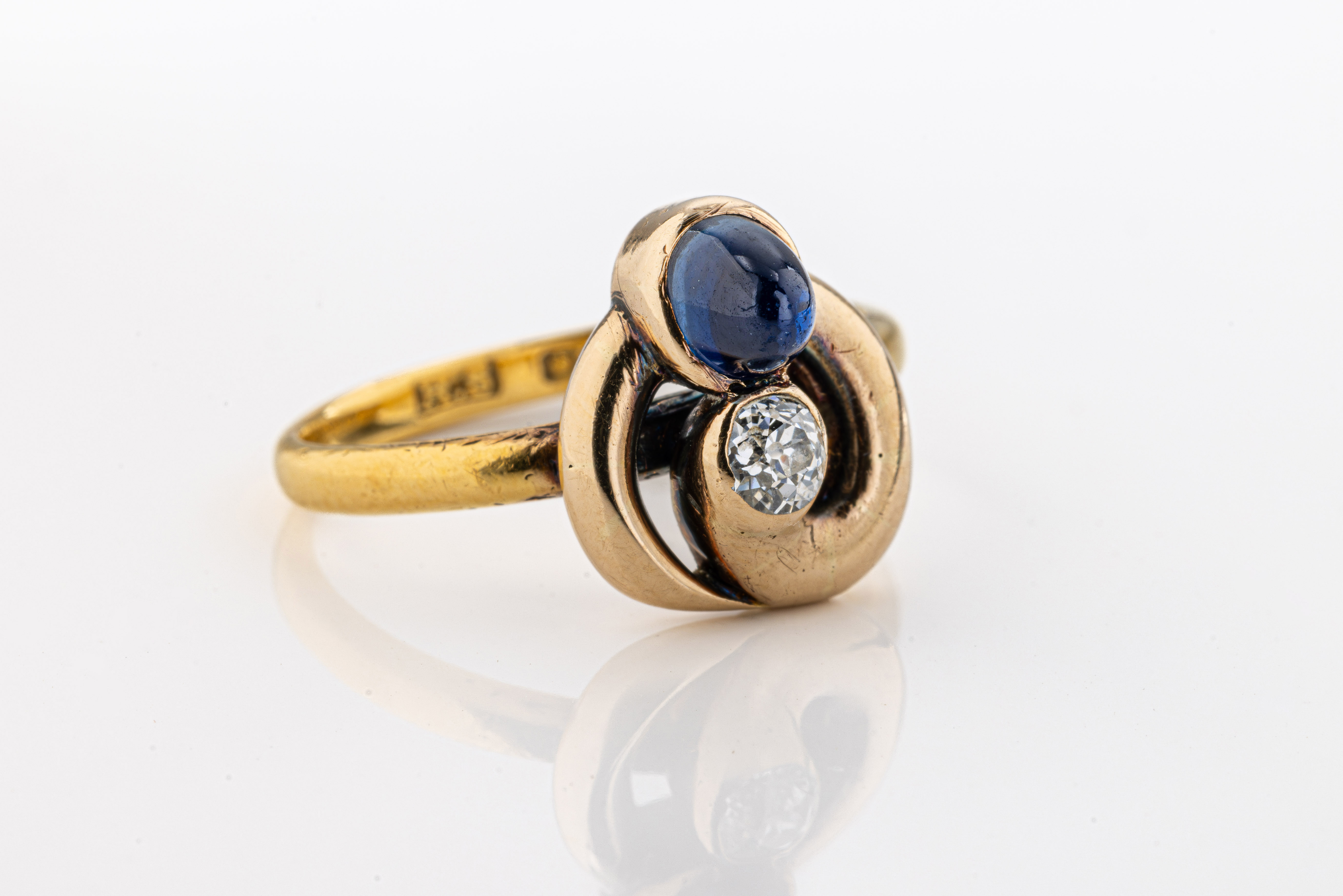 A 22ct yellow gold, diamond and sapphire ring