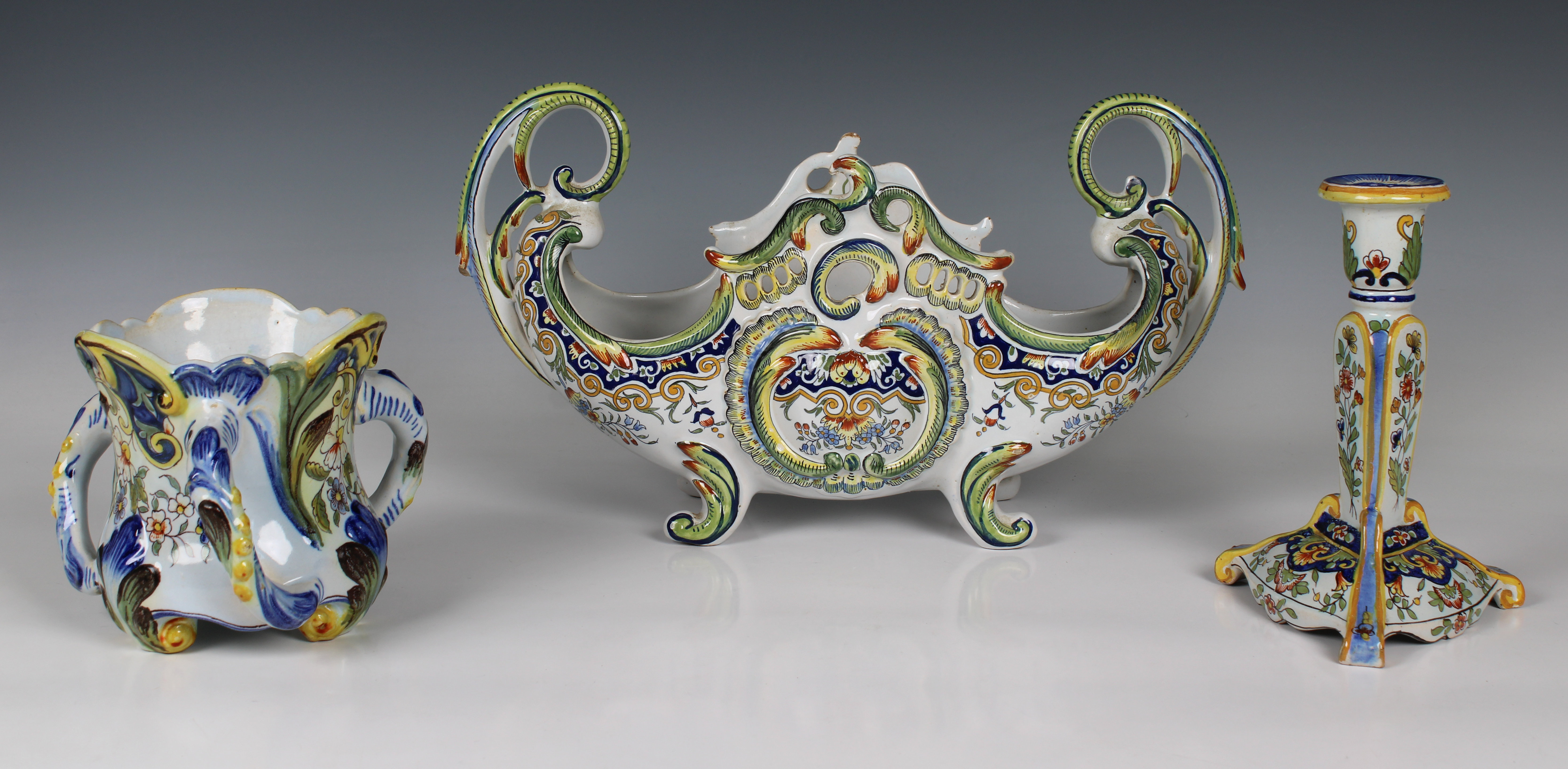 A French faience double handled jardinière raised on four feet - Image 2 of 4