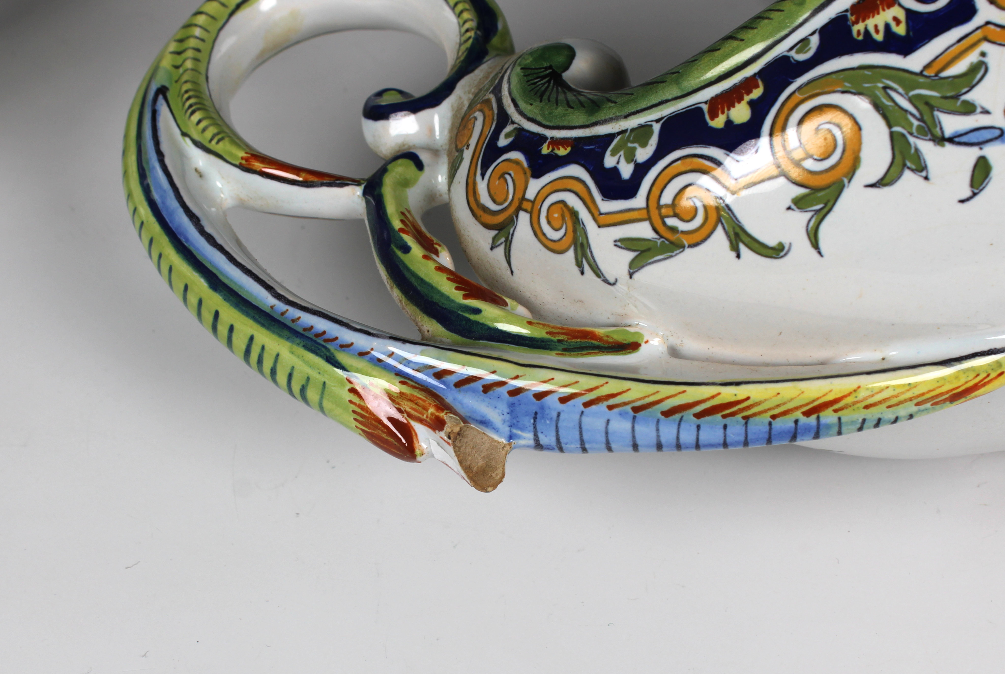 A French faience double handled jardinière raised on four feet - Image 3 of 4