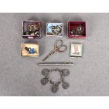 A rummage tray of various silver / white metal jewellery and collectables etc