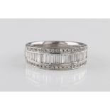 An 18ct white gold and diamond half eternity ring