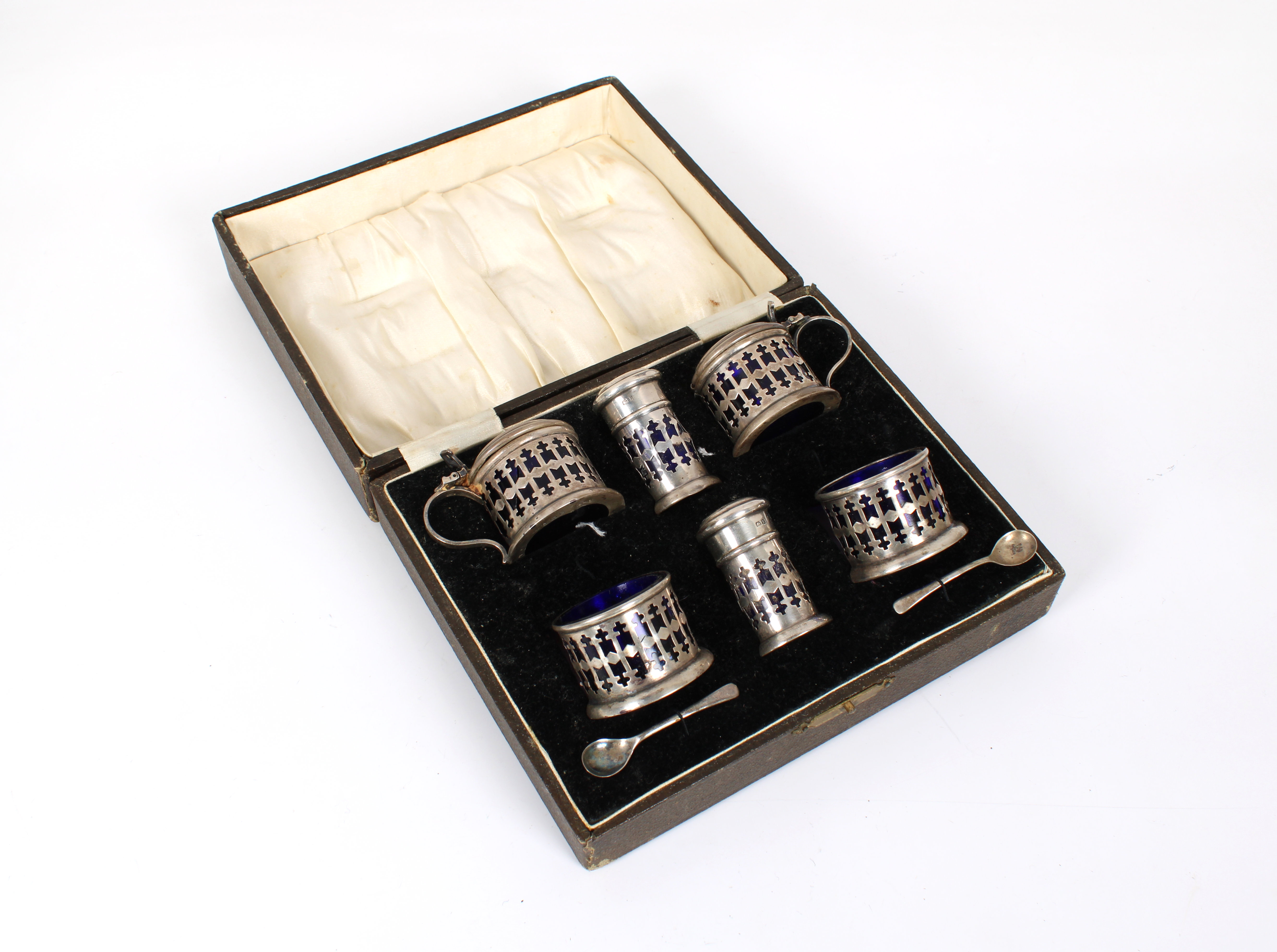 A George V cased silver cruet set