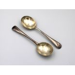 A pair of silver Old English pattern soup spoons