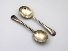 A pair of silver Old English pattern soup spoons