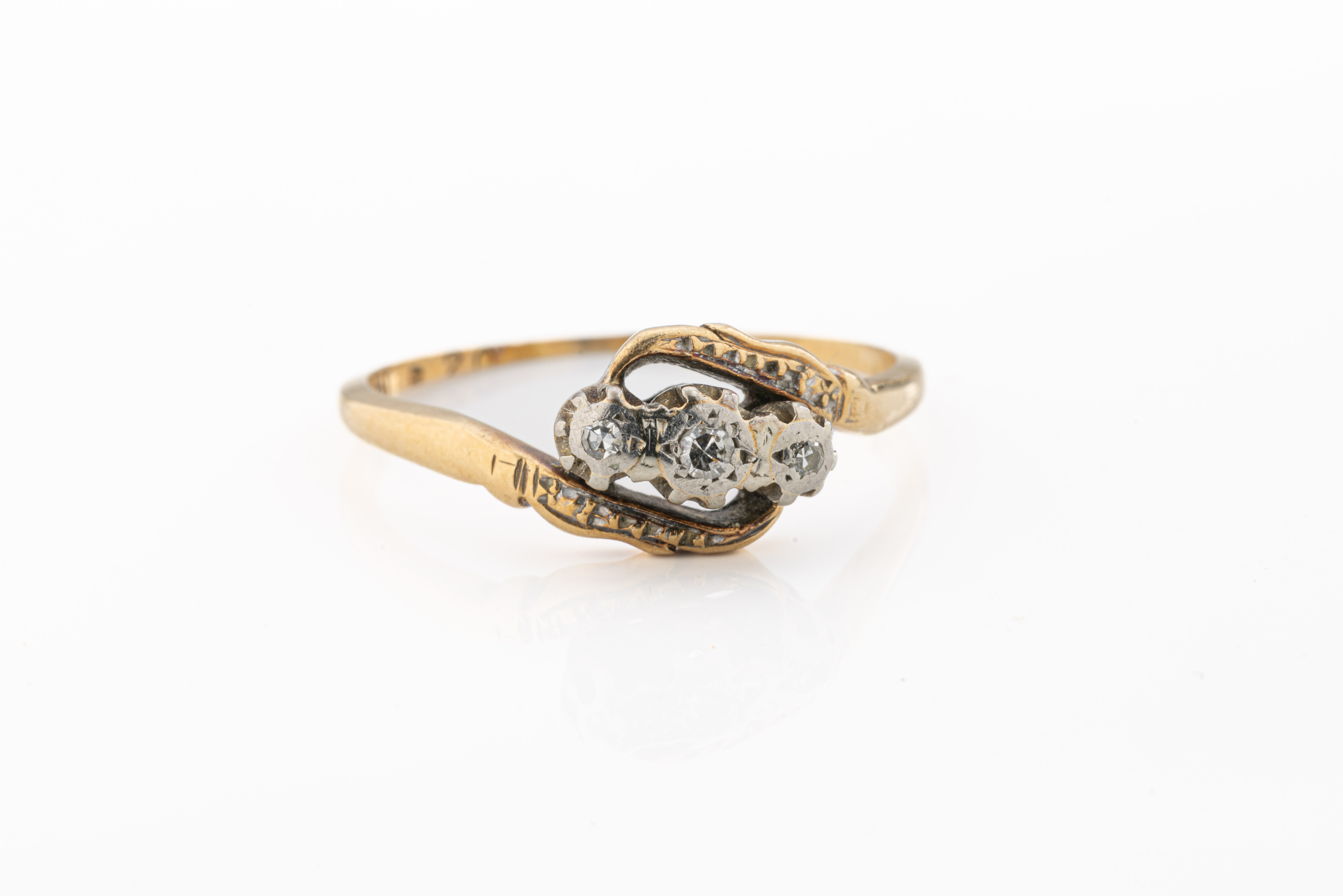 An 18ct yellow gold and platinum diamond ring