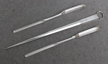 Two silver plated double ended marrow scoops