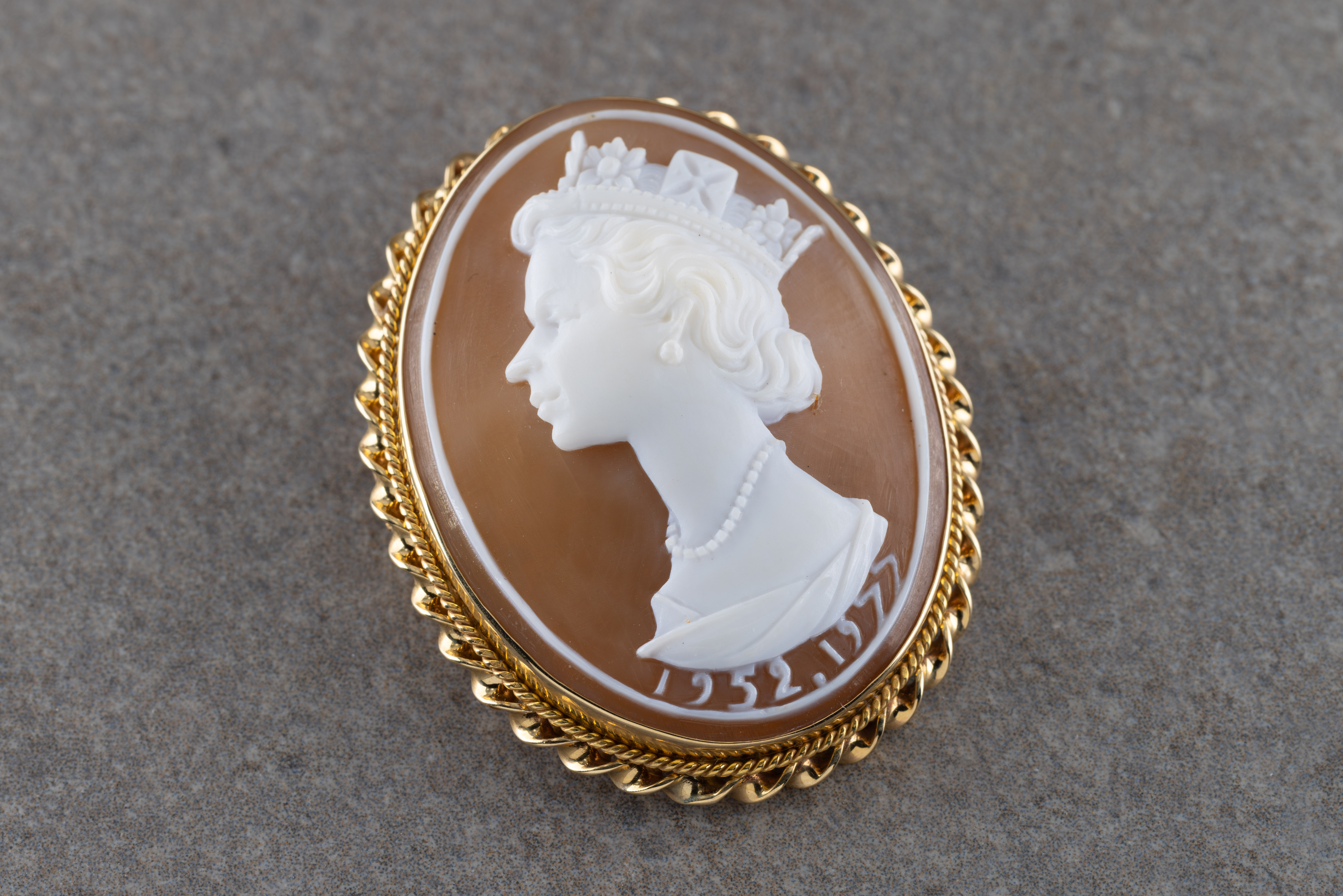 A shell cameo brooch of Queen Elizabeth II in a 9ct gold mount