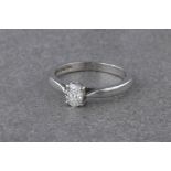 A platinum and diamond solitaire ring,