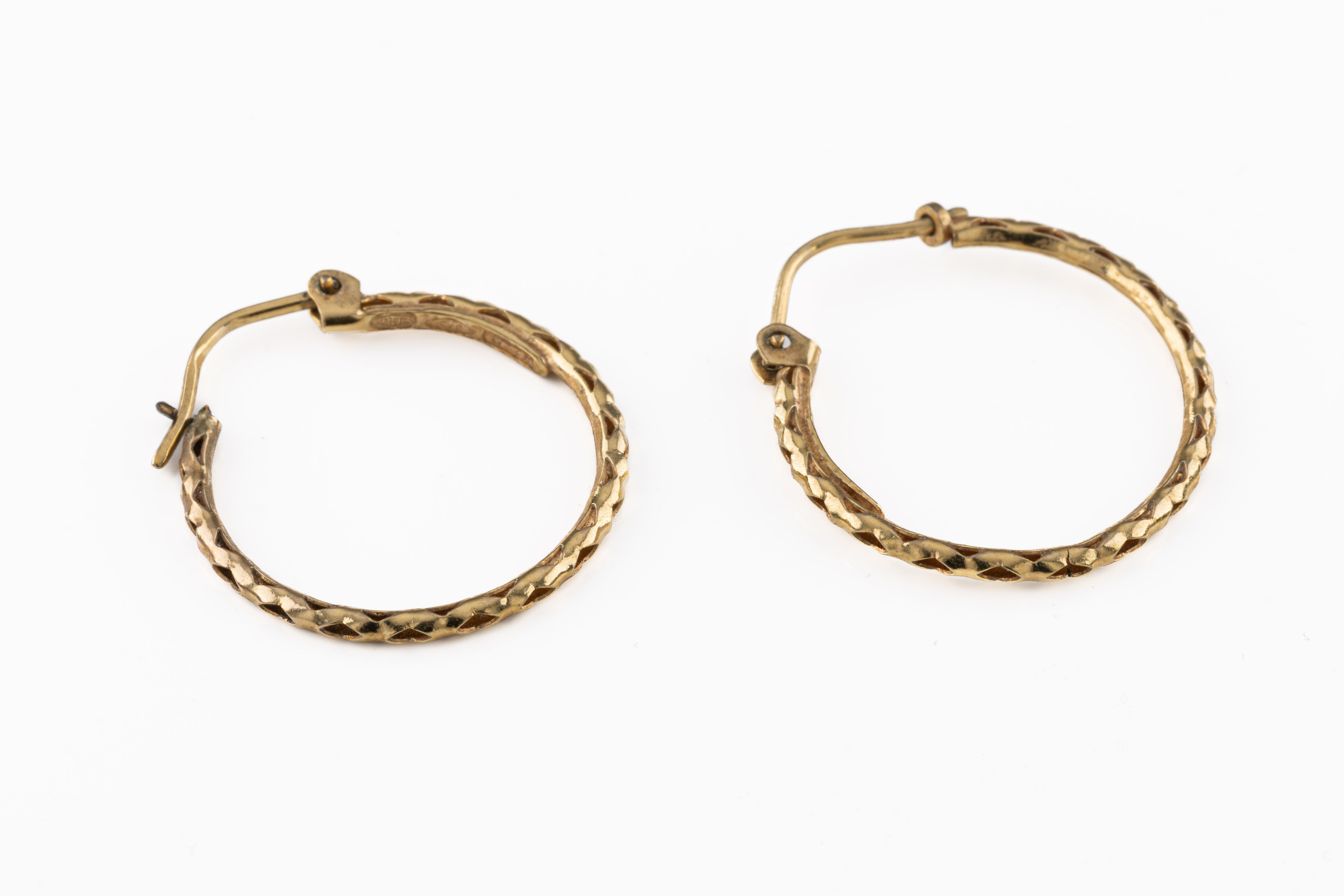 A pair of 9ct yellow gold hoops
