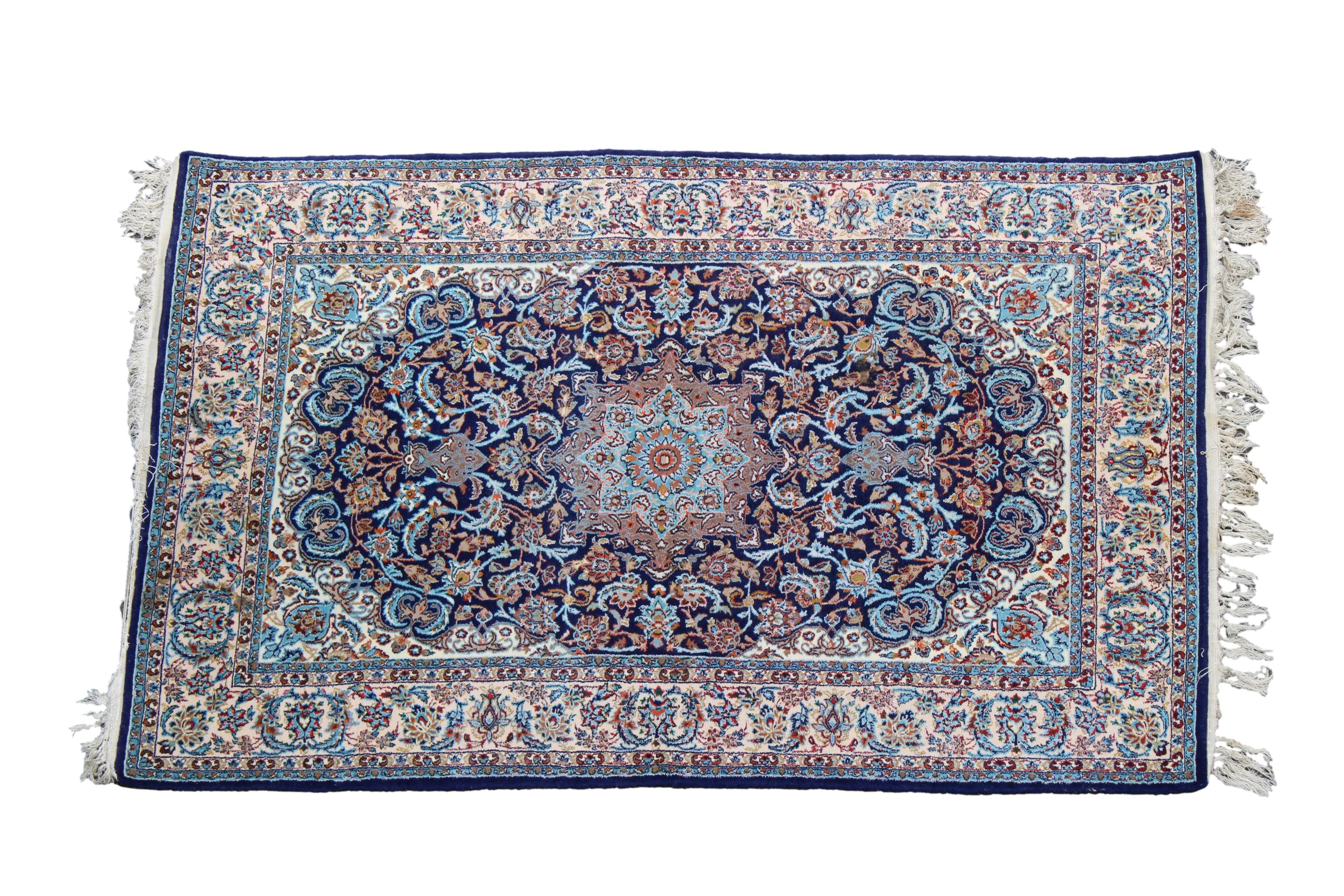 A small silk fringe Isfahan rug