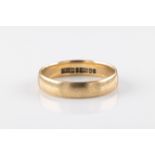 A 9ct yellow gold wedding ring