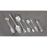 A collection of silver flatware