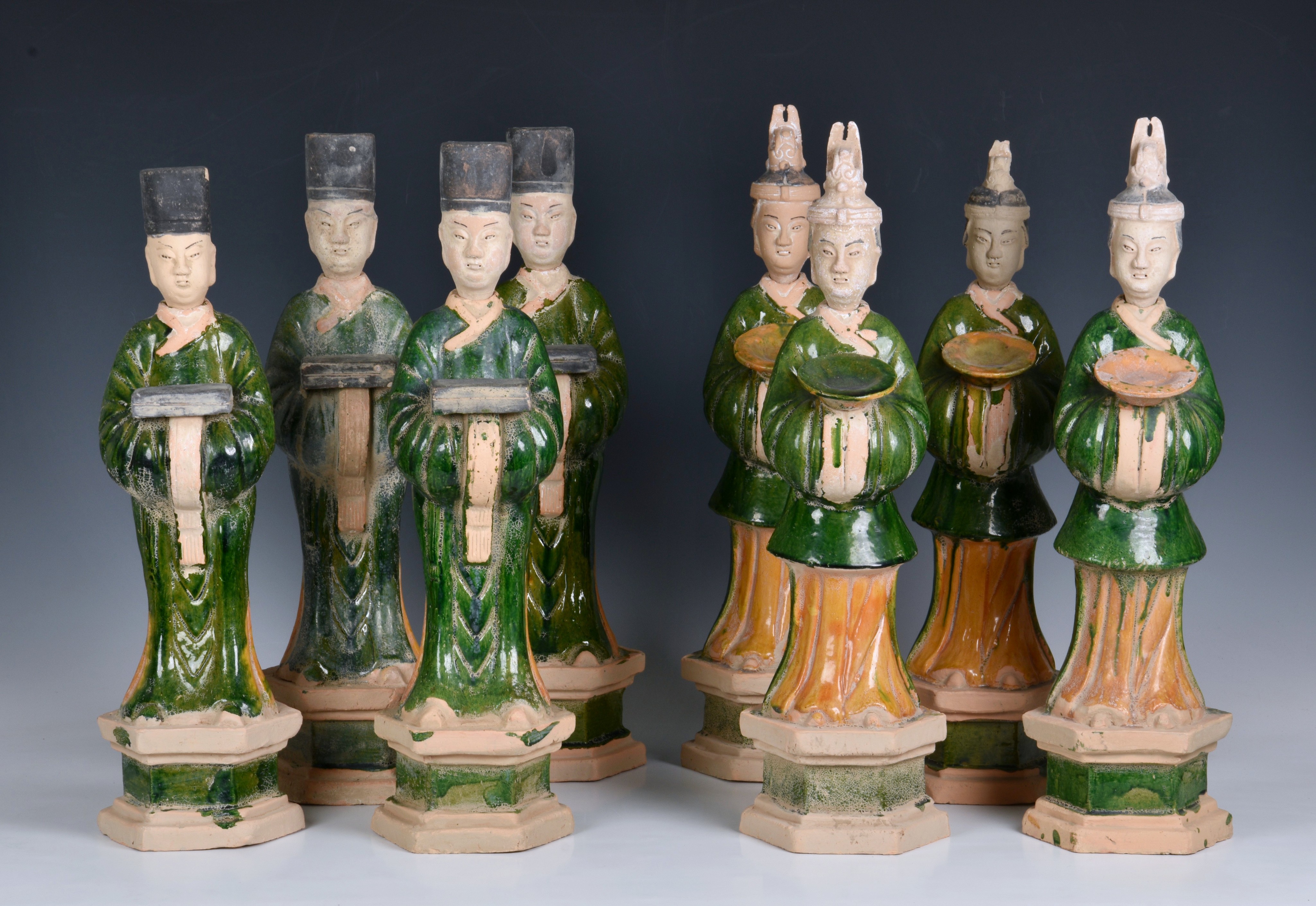 A set of eight Chinese Sancai glazed pottery tomb figures of Court Attendants
