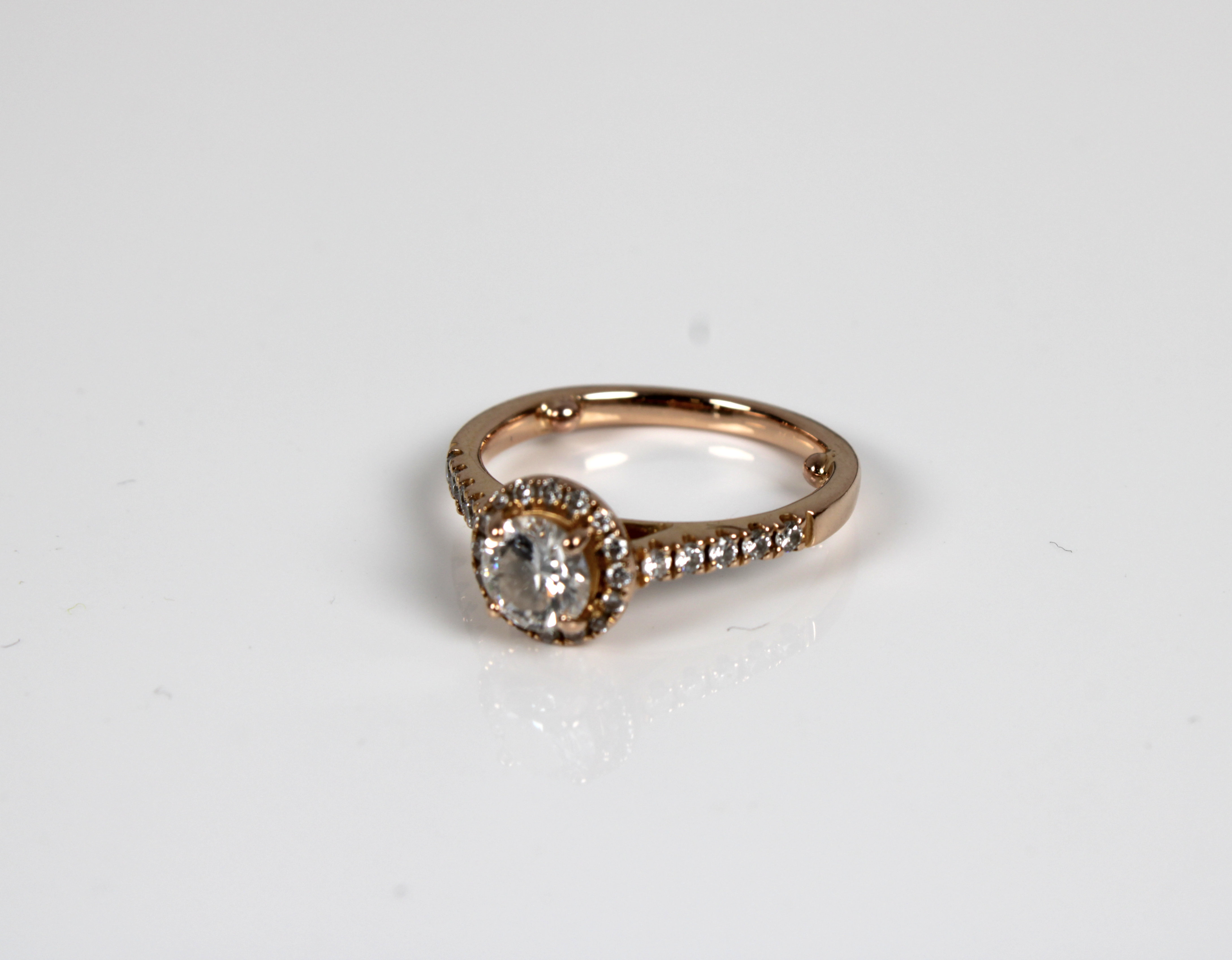 An 18ct rose gold diamond halo ring - Image 2 of 3