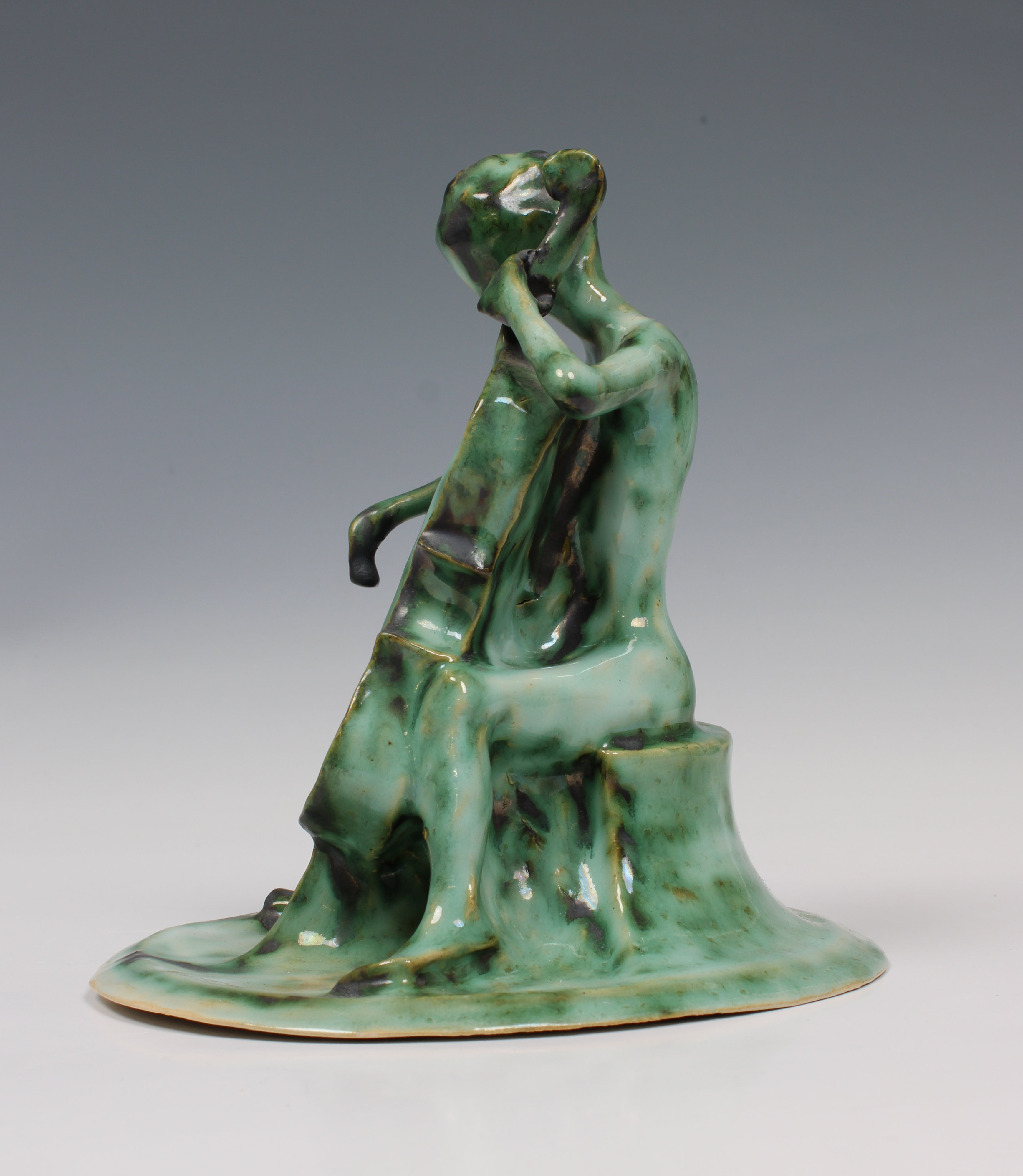 Elizabeth Ann Macphail (1939-89) A green glazed stylised cellist or double bass player sculpture - Image 2 of 5