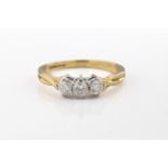 An 18ct yellow gold diamond three stone ring