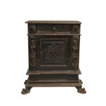 A heavily carved seventeenth century Italian credenza or side cabinet