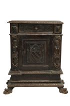 A heavily carved seventeenth century Italian credenza or side cabinet