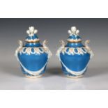 A pair of early 19th century Berlin KPM porcelain covered jars