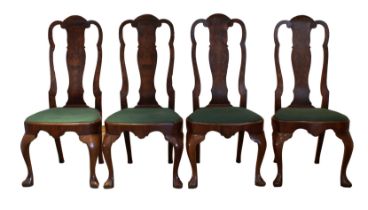 A Set of four George I style walnut side chairs