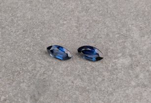 A loose pair of marquise cut blue sapphires