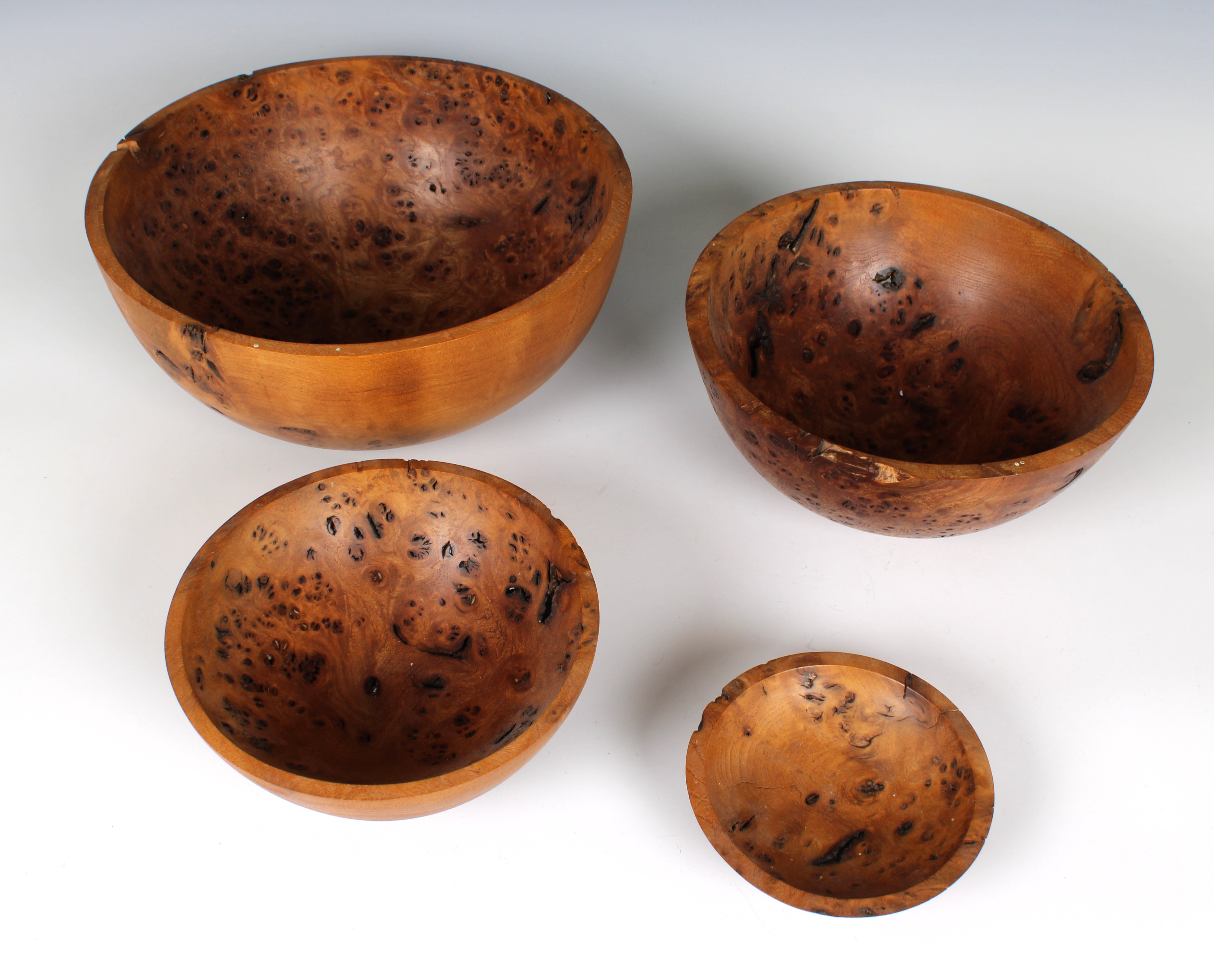 A set of four graduated turned burr wood bowls - Image 3 of 5