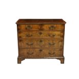 A George II and later walnut straight front chest