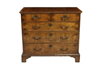 A George II and later walnut straight front chest
