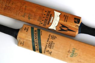 Two signed cricket bats