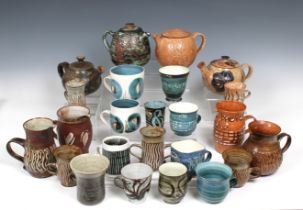 Elizabeth Ann Macphail (1939-89) A collection of teapots, milk jugs, cups / mugs